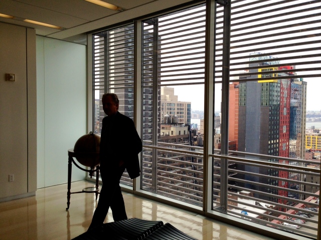 A silhouette of Arthur Suzberger Jr., publisher of The New York Times and chairman of The New York Times Company, against a window framing a Manhattan skyline.  Sulzberger hosted a lunch on Jan. 22 at The New York Times for the Wisconsin Center for Investigative Journalism to talk about the future of investigative journalism. In addition to Sulzberger, also present at the meeting were: Matt Purdy, deputy executive editor at The New York Times, Walt Bogdanich, NYT investigative reporter and editor, and an alumnus of the University of Wisconsin-Madison School of Journalism and Mass Communication; Sarah Cohen, editor of NYT computer-assisted reporting team and board president of Investigative Reporters and Editors; Robert Gebeloff, NYT data journalism specialist and a UW-Madison SJMC alumnus; Gloria Anderson, UW-Madison SJMC alumnus and former vice president for International and Editorial Development at NYT News Services Division; Brant Houston, WCIJ board president and the John S. and James L. Knight Foundation Chair in Investigative and Enterprise Reporting at the University of Illinois at Urbana-Champaign; Hemant Shah, WCIJ board member and director of the University of Wisconsin-Madison SJMC; Andy Hall, WCIJ founder and executive director; Lauren Fuhrmann, WCIJ associate director; Sara Jerving, former WCIJ intern and an environmental investigative reporting fellow at Columbia University Graduate School of Journalism; Alexandra Tempus, former WCIJ intern and a writer in New York; and me, Karen Lincoln Michel, WCIJ board vice president.